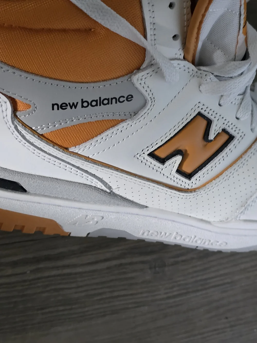 New Balance White and Orange Mid-Top Athletic Sneakers